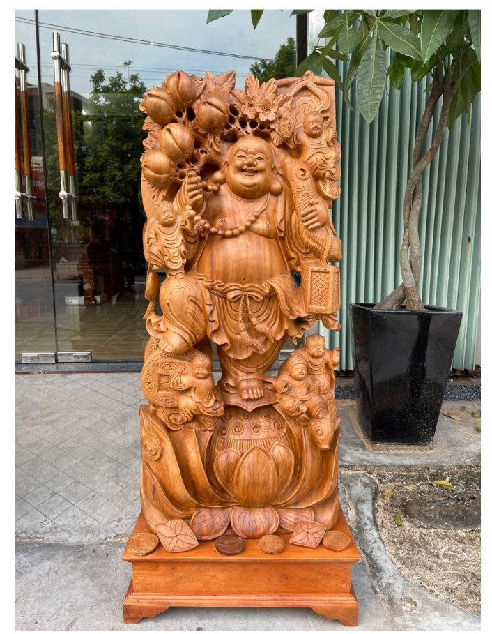 Tượng Ngài Di Lặc đứng vác cành đào 2.png